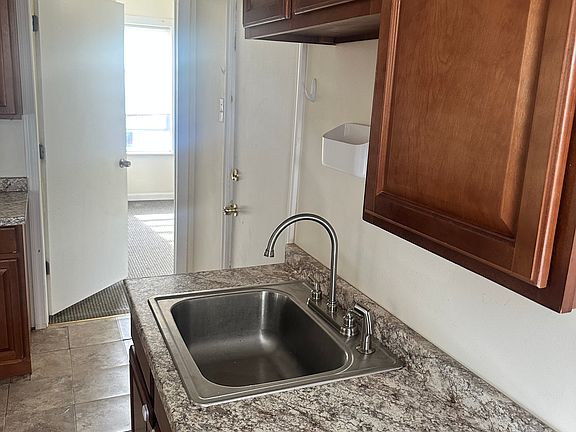 Side of Kitchen onlooking Bedroom 3