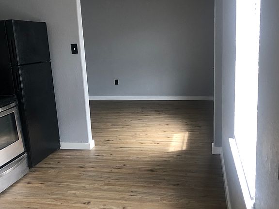 Kitchen looking to living room