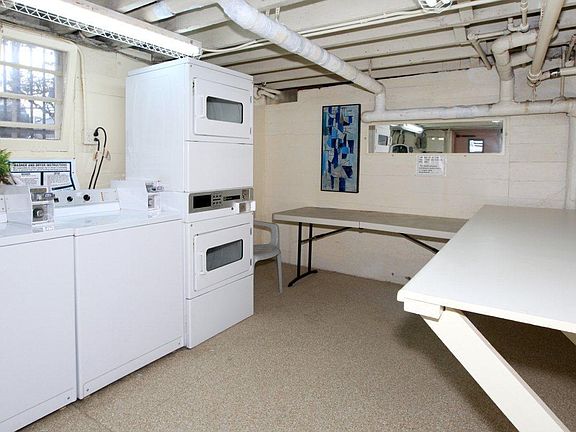 Laundry Room. Brightly lit with windows.