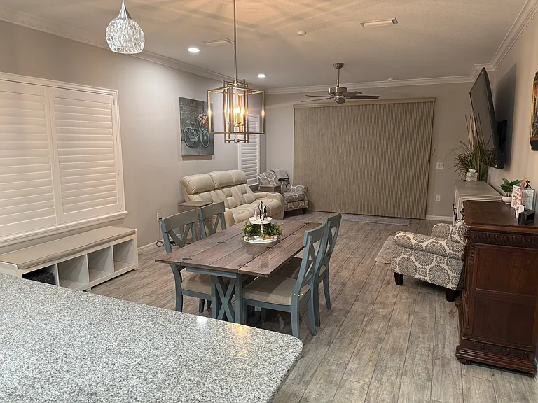 Dining table folds out - seating for 4 with island stools as well