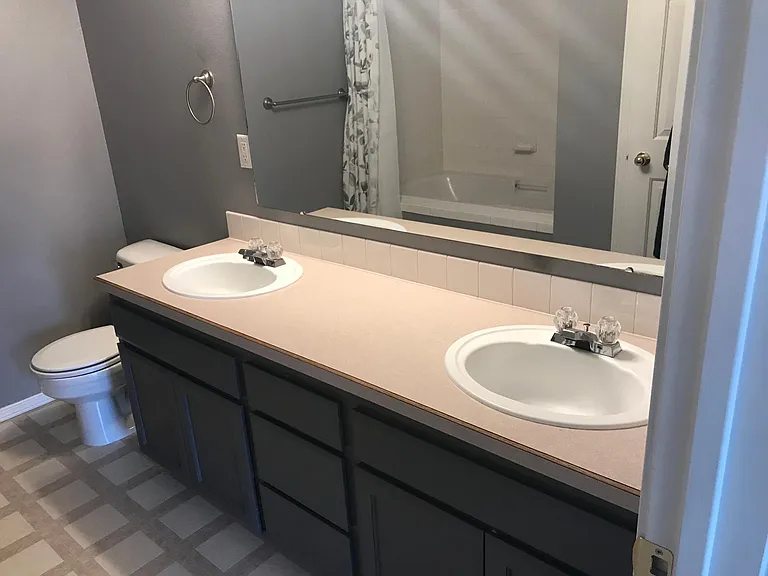 Master suite has large double vanity providing storage and space to keep peace in the bathroom.