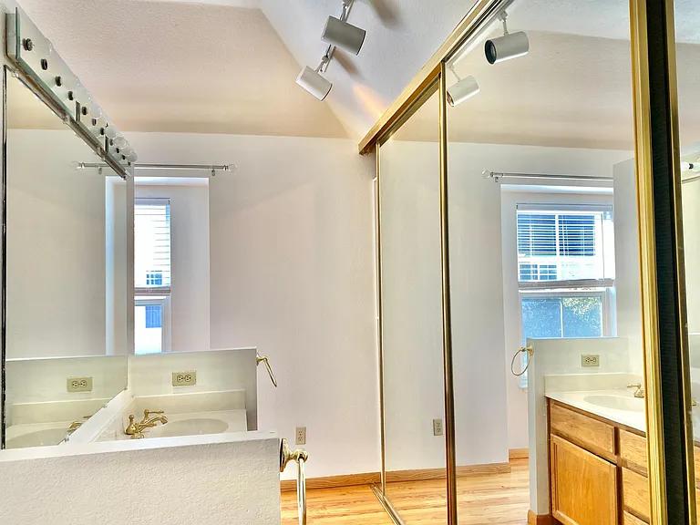 Double sink and large closet area in primary bedroom