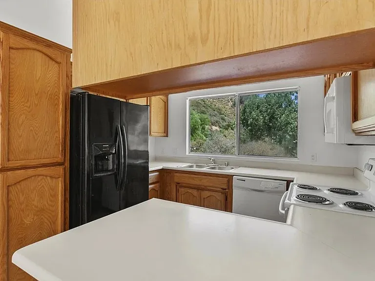 kitchen with open floor plan living room