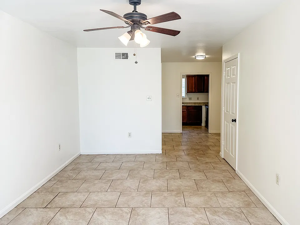 Living area open up into dining space
