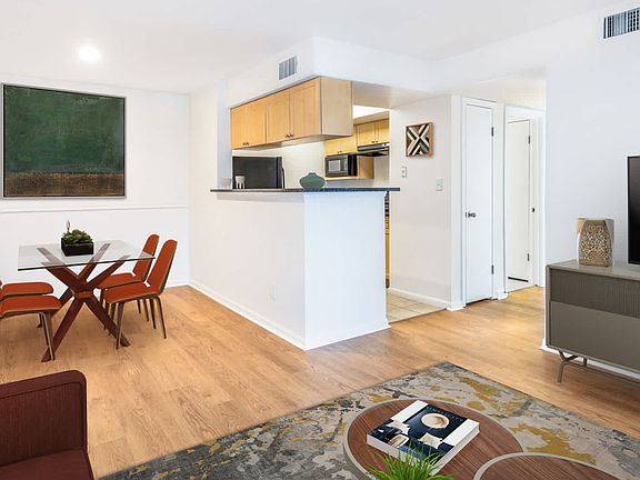 Kitchen and Dining Room with Hard Surface Flooring
