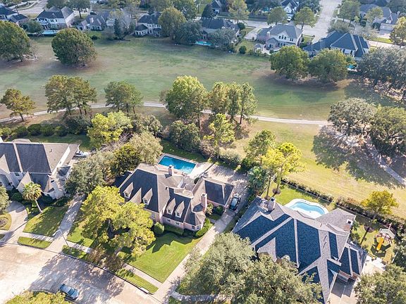 Perfect location on the golf course with a pool and spa and 4621 square feet of living space.