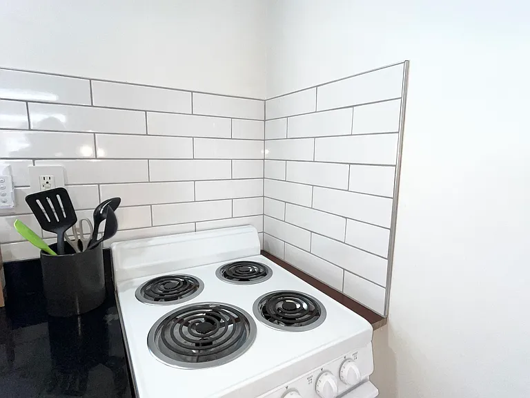 Subway tile and fully functional kitchen with storage