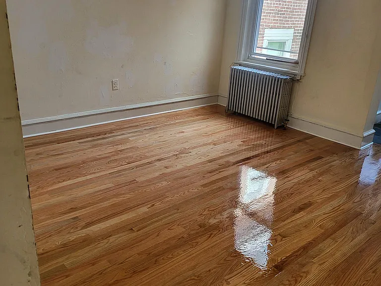LG living room high ceilingtall window! NEW WOOD FLOOR!