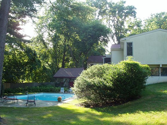 Backyard.  Pool and Spring house