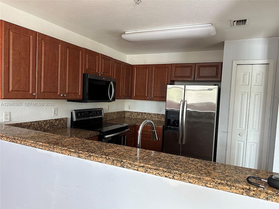 1st image of 11002 NW 83rd St APT 215