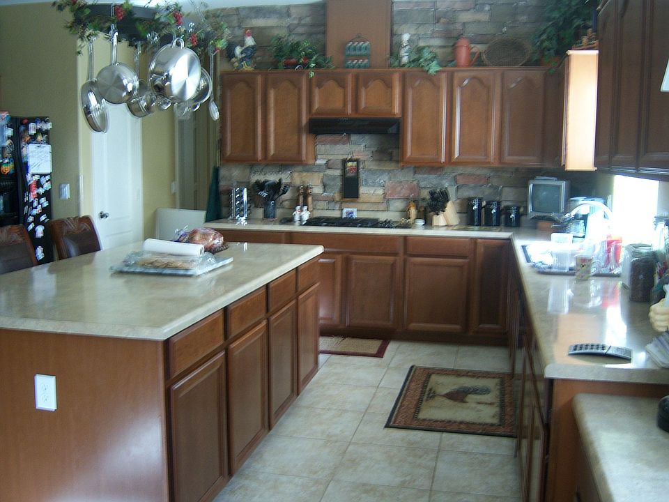 Gourmet kitchen w/ double oven, gas cook top, cherry cabinets, walk in pantry
