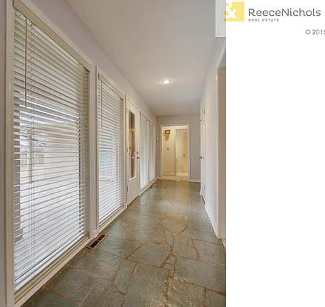 Gallery opens to back courtyard