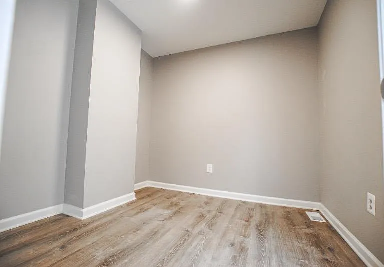 Head upstairs to find 2 bedrooms, a den, and bathroom