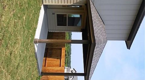 Patio. Photos of a similar home. Actual home under construction.