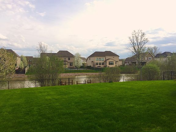 backyard with pond and dock