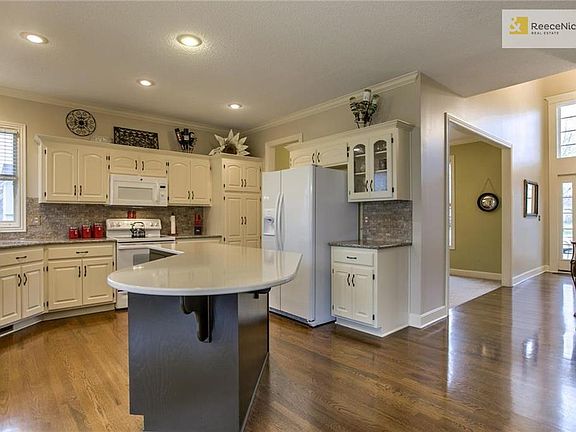 Kitchen is open to family room for easy entertaining.