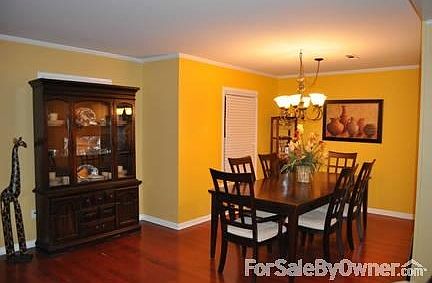 Den (3)
						:
						Step up and french doors leading into the kitchen