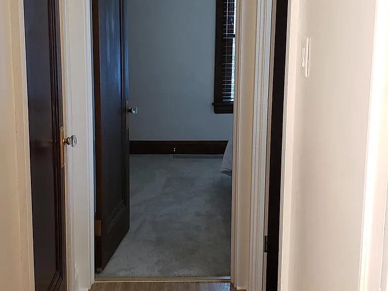 Interior hallway. View from bedroom #2. Both bedrooms and your bathroom are located here. Bedroom #1 straight ahead.