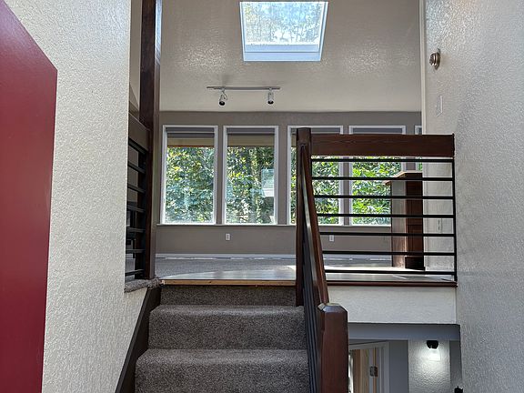 Entry to living room , kitchen and dining room and patio deck