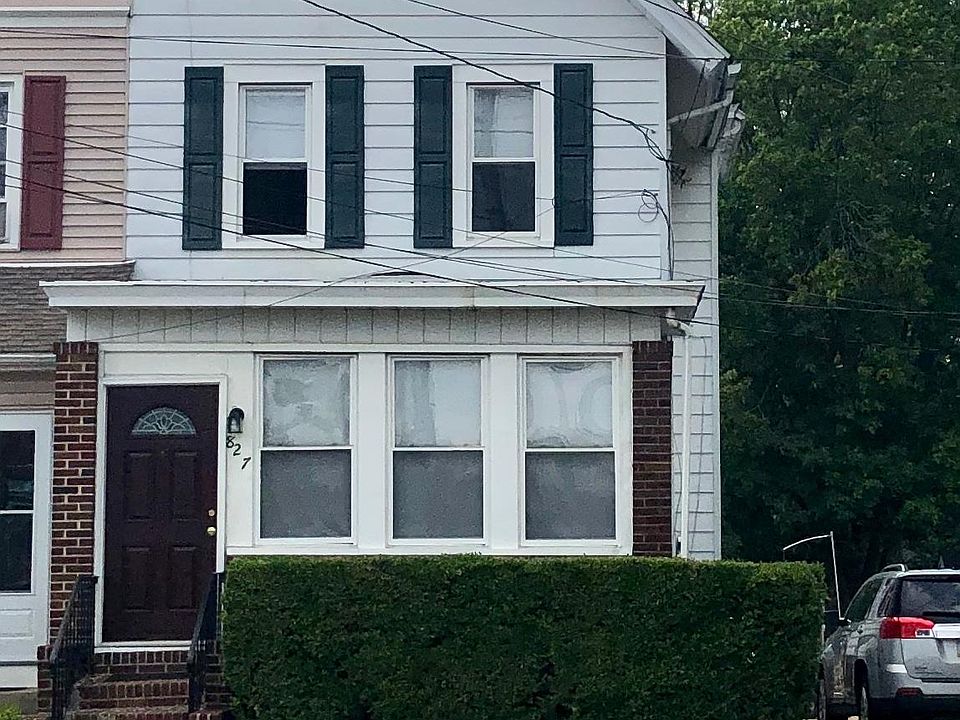 Private entrance is in front of the house. Driveway on side of house (parking for two cars)
