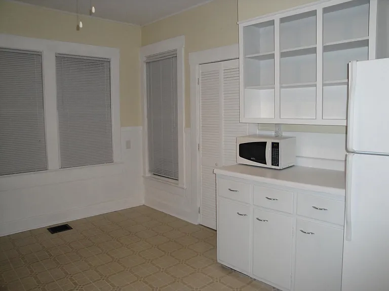 Kitchen (south wall) with pantry and area for small table and chairs