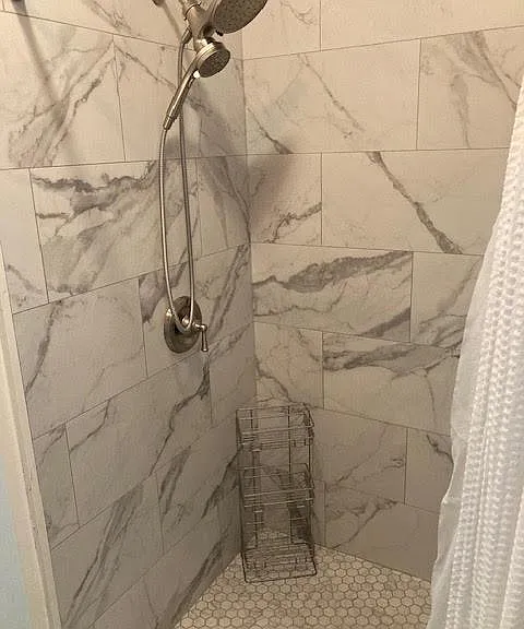 master bath with large format tiles