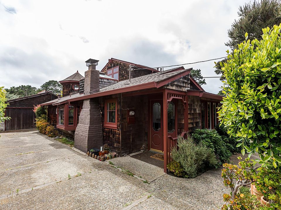 Home from street. Driveway parking and one car garage. All Photos by Shannon Cronin Photography