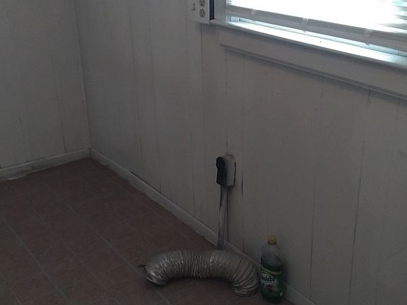 Utility Porch (Washing Machine and dryer connections ).