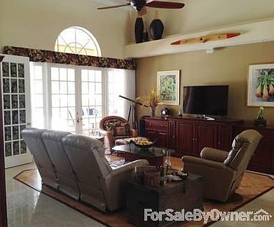 Living Room
						:
						14 Foot High Ceilings, Custom Oak and Tile Floors