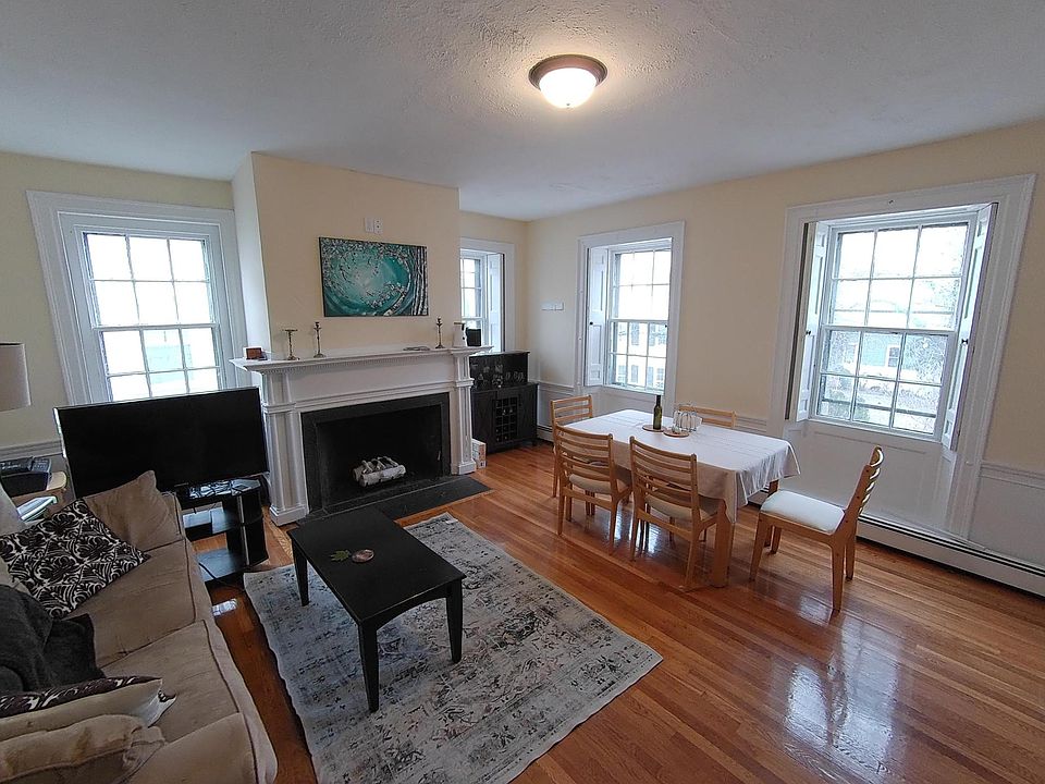 Light filled living room with hardwood floors