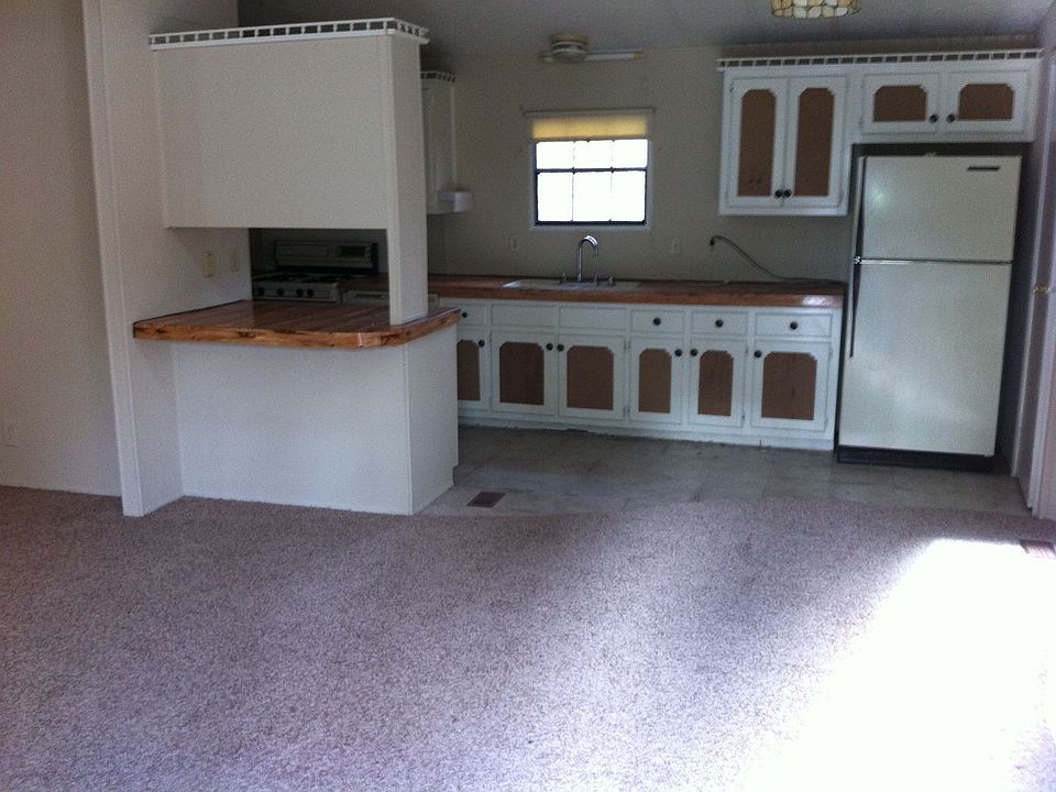 Kitchen with eat in area to the right