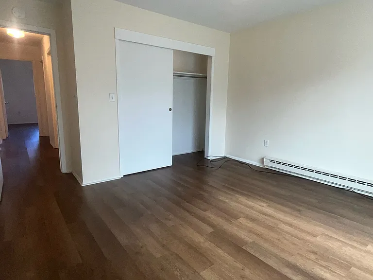 Bedroom 1, large closet and sliding door to second private balcony