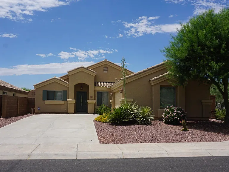 Front View: Corner Lot, Extended driveway