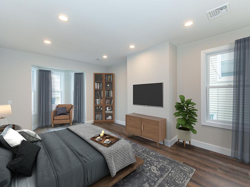 Primary bedroom is spacious with ensuite bathroom and closet