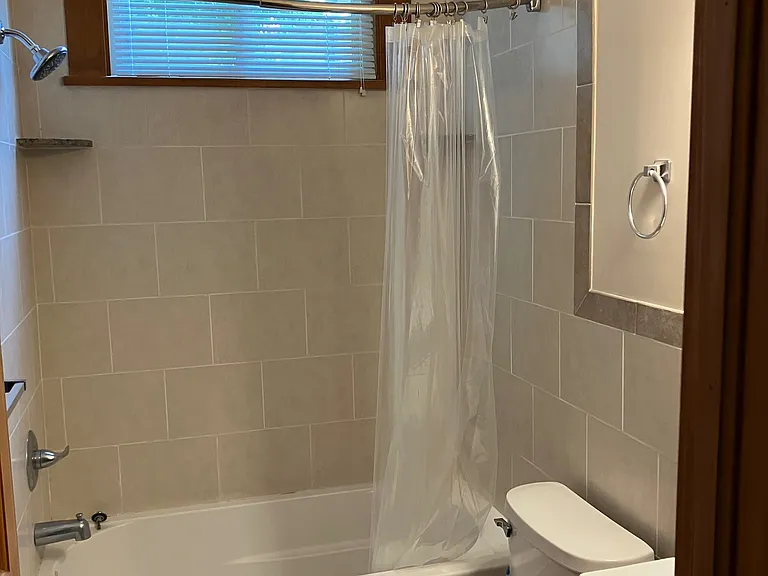 Full Bath with tub that includes shower