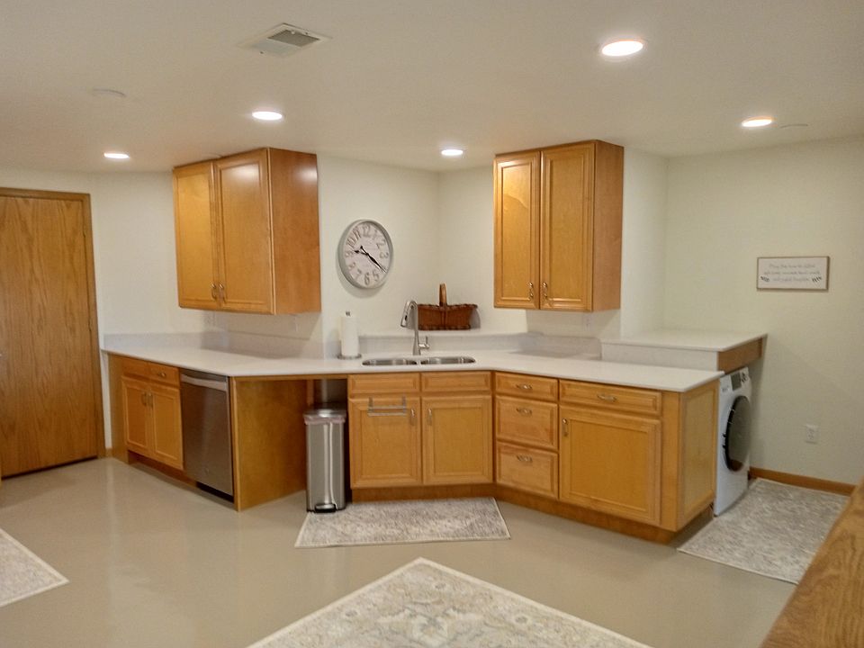 Kitchen with dishwasher and combo washer/dryer
