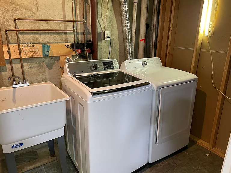 Laundry area in basement