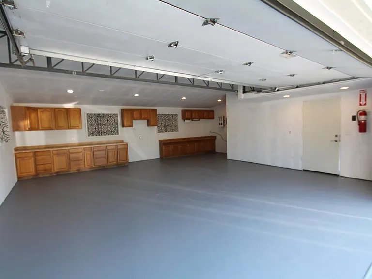 Finished/heated double car garage.