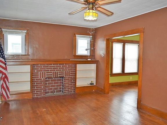 Living room.  Pre-installed blinds.