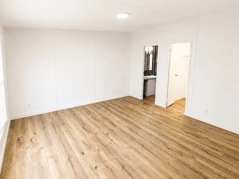 Primary bedroom with attached bath and large walk in closed