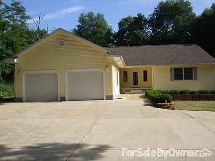 Spacious Living!
						:
						Surrounded by trees on 4+ acres home tucked away yet easy access to lakes/town
