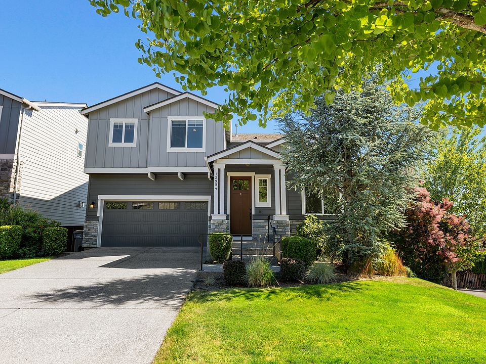 Front of house; corner lot on quiet neighborhood streets, lots of trees.