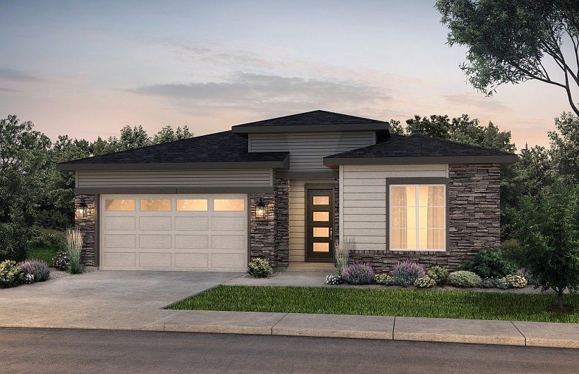 The Prairie elevation boasts a contemporary design with stylish stone accents throughout.