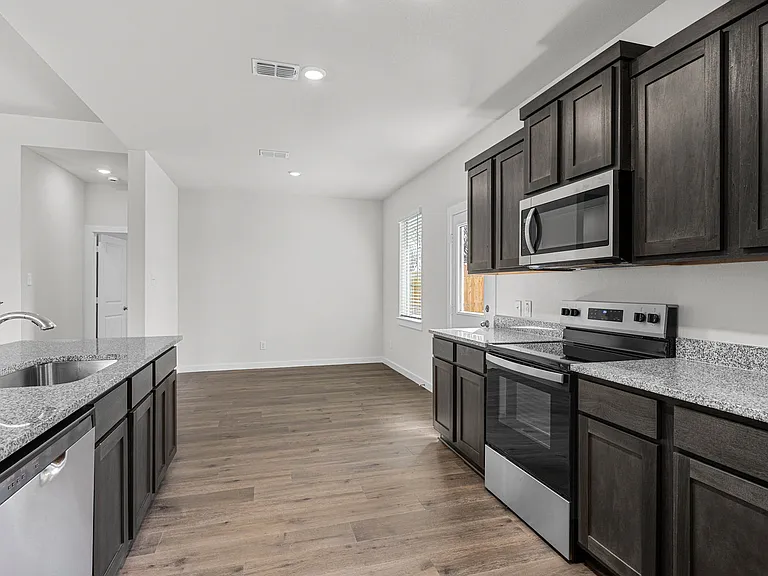 The dining room sits right off of the kitchen.