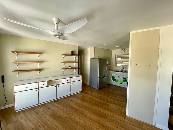 Dining room and kitchen (open layout) - view from living room (top-of-the-line ceiling fans in dining room and master bedroom)
