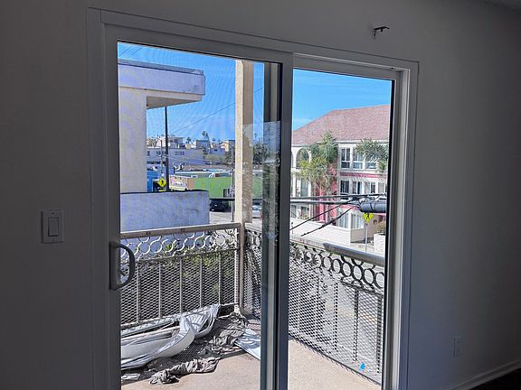 6+ foot by 11 foot balcony is accessible from new living room sliding glass door (materials on balcony have since been removed)