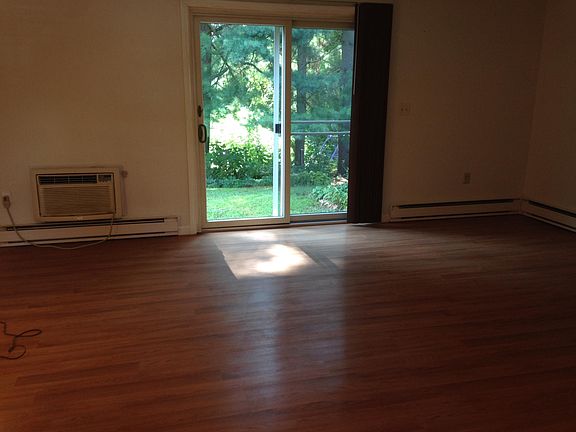 Living area w/ slider to backyard.