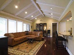 FAMILY ROOM Wow! What a terrific room that opens off of the gourmet kitchen. A wall of windows, agai