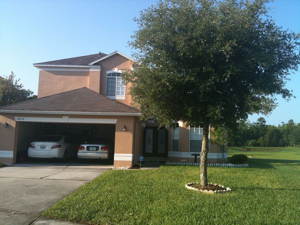 Front view and 2 car garage