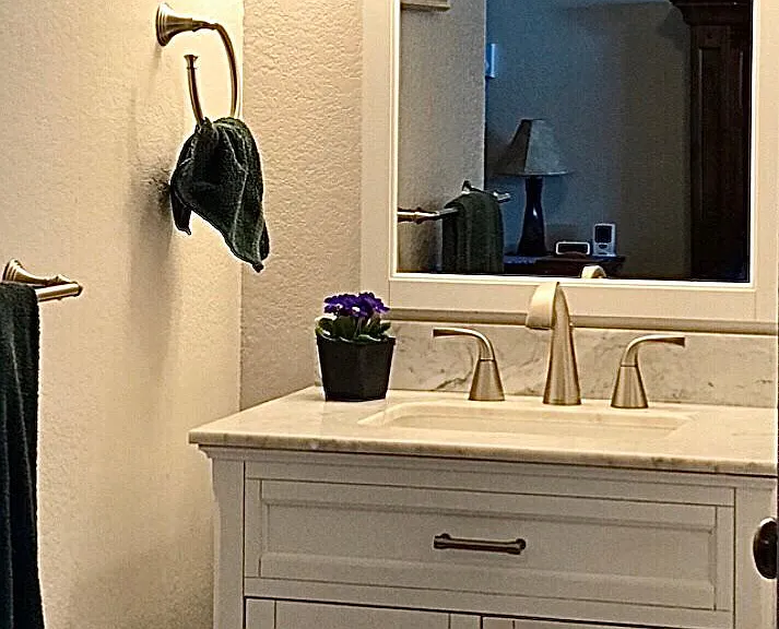marble top vanity off master bedroom